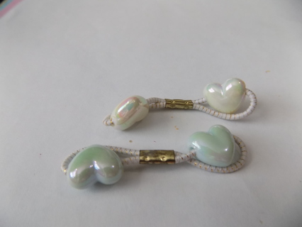 Pair of irredescent hearts ponytail holders 1 pink 1 mint green