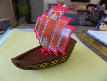 5 inch tall pirate ship push toy with big red sails