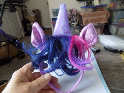 Unicorn head band irredescent purple horn blue and pink hair