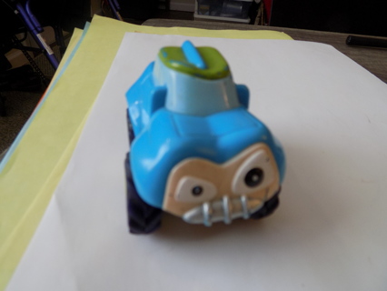 Toddler blue truck with face on the grill