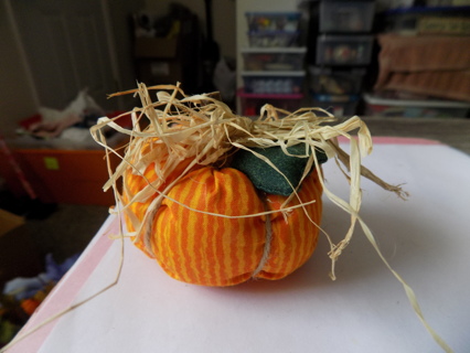 3 inch round # 4 orange, white striped pumpkin wood stem fabric leaf, raffia