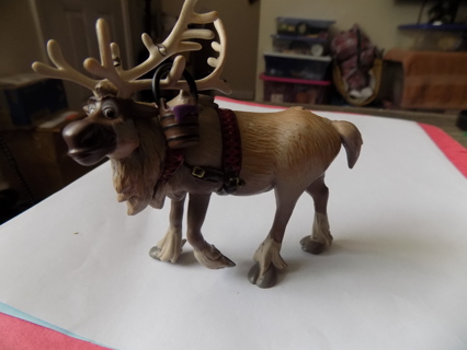 4 inch tall Sven from Disney's Frozen with basket hanging on his antlers, in harness