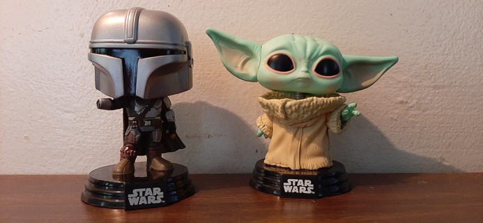 Two Funko Pop Figures Bobbleheads Yoda
