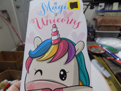 Hard board child's book The Magic of Unicorns