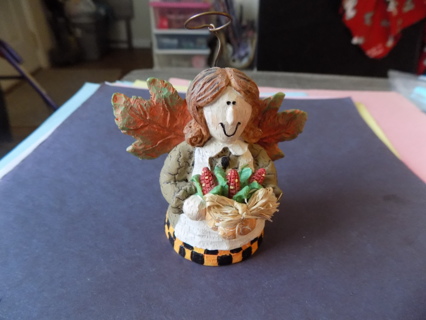 3 1/2 inch Autumn angel with Autumn leaf wings, holds basket of corn