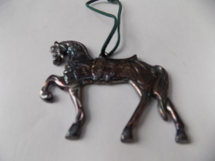 Vintage metal carousel horse ornament has look of spilled oil 3 inch wide