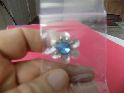 Acrylic six petal flower embellishment blue stone center