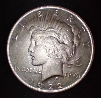 COIN 1922 SILVER DOLLAR IN VERY NICE CONDITION FOR ITS AGE AND IT'S A STEAL OF A DEAL SO GRAB IT!