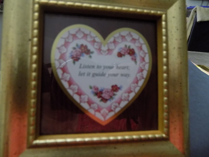 4 inch square gold wood frame Has heart & flowers in middle says Listen to your heart