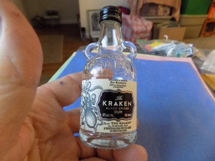 4 inch tall the KRAKEN empty black spiced rum bottle, screw off lid, double handles