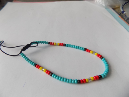 Bracelet seed beads turquoise, red, yellow, black