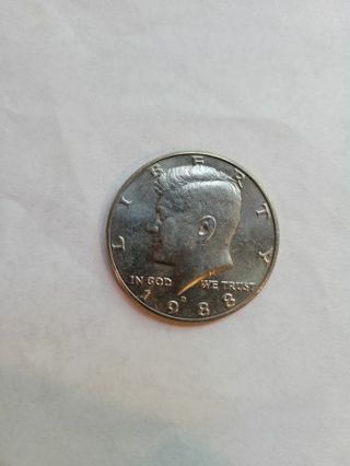 1988d Kennedy half dollar.