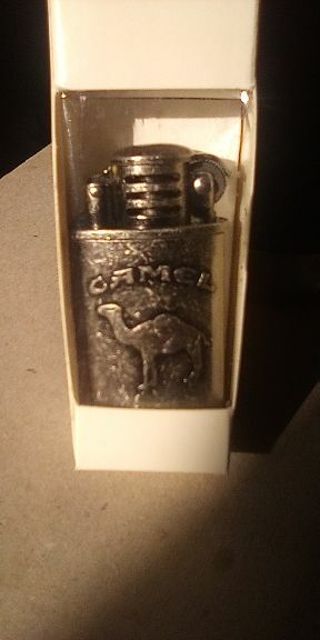 VINTAGE CAMEL FLIP TOP LIGHTER. IN BOX. NEVER USED.. $25.00 ON EBAY USED