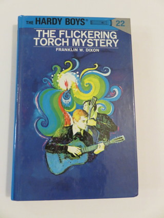 The Flickering Torch Mystery Hardy Boys #22