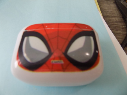 Small white plastic hinged case with Spiderman face on front