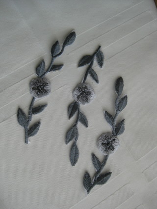 3 embroidered gray iron on patches, branch w leaves and a flower