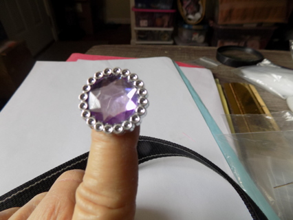 Child's ring large round purple jewel