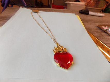 Large faceted red heart necklace with goldtone princess crown on the charm