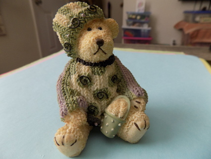 Plum pudding Co 3 inch textured bear sitting up wears green knit hat, sweater