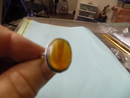Silverplated ring size 8 with large Amber gemstone center 1 inch long
