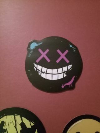 Black and purple xx smiley sticker