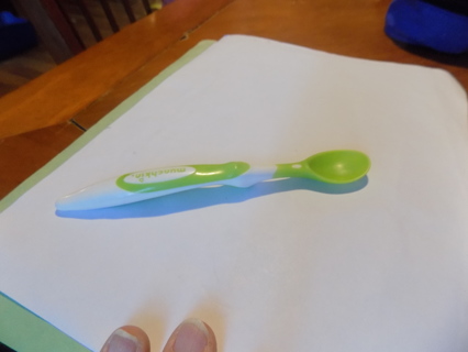 Munchin green and white baby spoon