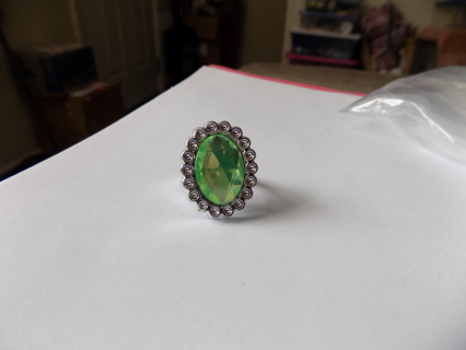 Childs ring large green oval jewel