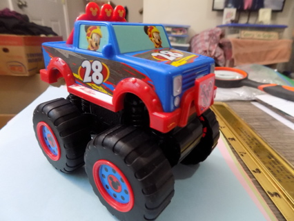 5 inch long and 4 1/2 tall Mickey mouse in blue & red # 28 Monster truck red/blue wheels