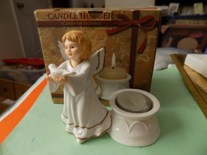 Fine porcelain angel tea light candle holder holds a dove in original box