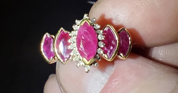 RING NATURAL RUBIES AND DIAMONDS SET INTO A 10K YELLOW GOLD MOUNTING SIZE SEVEN BUY IT WITH POINTS!