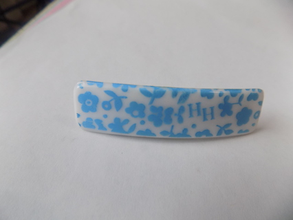 2 1/2 inch wide white barrette with blue flowers