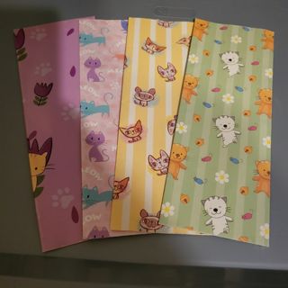 Assorted cat themed wrapping paper