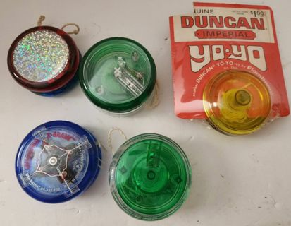 Set of 5 YO-YOs with instruction book: Duncan, Spryware, Cool Novelty, Yamega, & Koosh Proyo