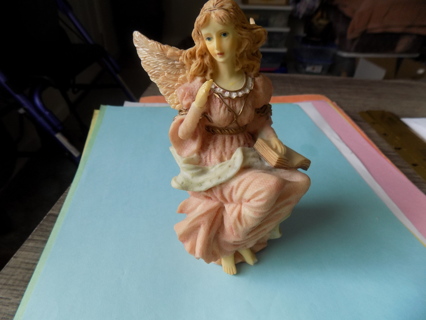 Vintage resin pastel color angel sitting down with open book on lap pink gown