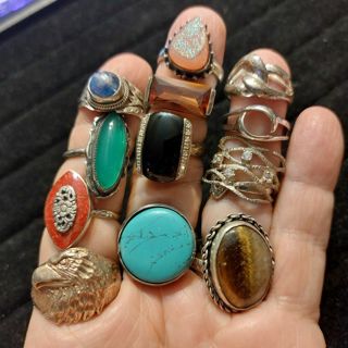 Dozen sterling silver stone rings variety