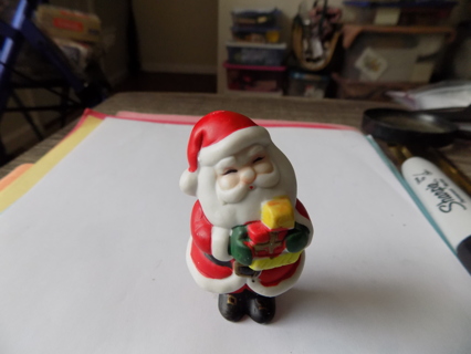 3 inch porcelain Santa Claus holding presents
