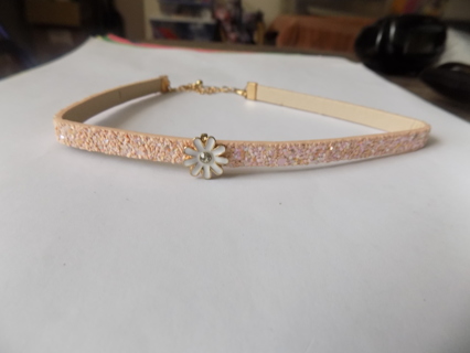 Pink leather glittery choker necklace with white enamel daisy on front goldtone chain back