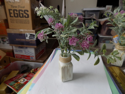 White ribbed square base vase with bouquet of purple flowers # 2