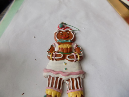 5 inch gingerbread girl ornament red & white hat, holds cupcake , white apron