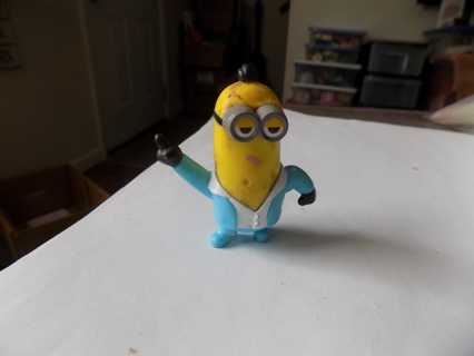 Minion 2 1/2 tall on blue and white suit