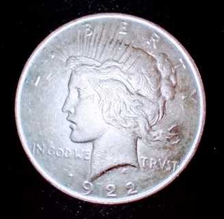 COIN SILVER DOLLAR 1922 A BEAUTY AND IT'S AT A PRICE YOU CAN AFFORD SO BUY IT!
