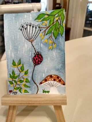 Original Watercolor Painting 2-1/2X 3/1/2" Whimsical Lady Bug caught in storm by Artist Marykay Bond
