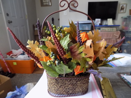 12 inch tall fall centerpiece metal oval basket filled fall flowers, seed pods,