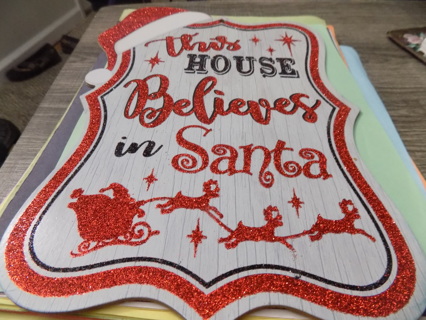 Wooden 12 inch This House Believes in Santa glittery wall hanging