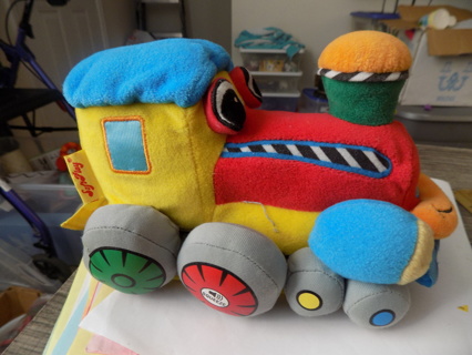 Soft play train engine plush with fabric book attached to bottom
