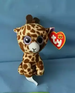 new  with TY TAG=BOOS,TWIGS THE GIRAFFE PLUSH with glitter eyes =4 1/2"