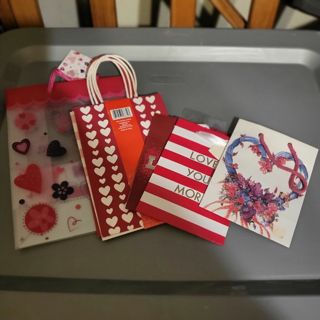 Assorted valentines themed gift bags.