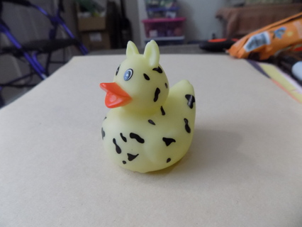 rubber duckie pale yellow with black cheetah marks