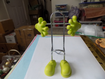 Whimsical 5 inch metal and green hands phone holder