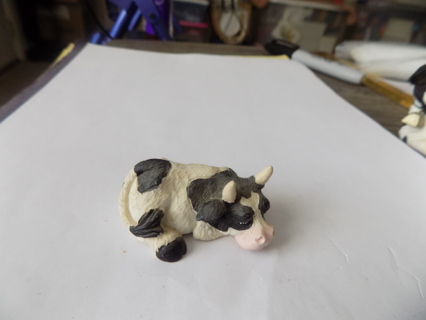 2 inch resin black and white sleeping cow